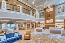 Concierge Desk and Open Lobby at The Village at Orchard Ridge Village Center
